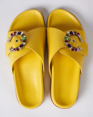 yellow flat sandal with multi colored crystal adjustable strap